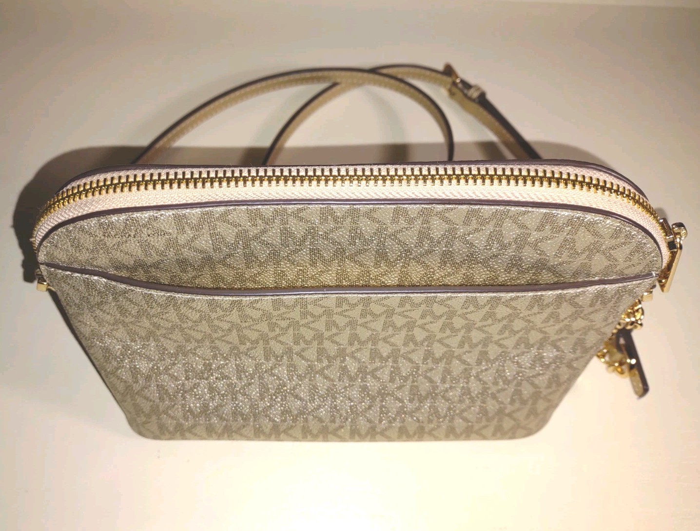 Michael Kors Jet Set Travel Dome Crossbody – Pale Gold Metallic Logo Design
